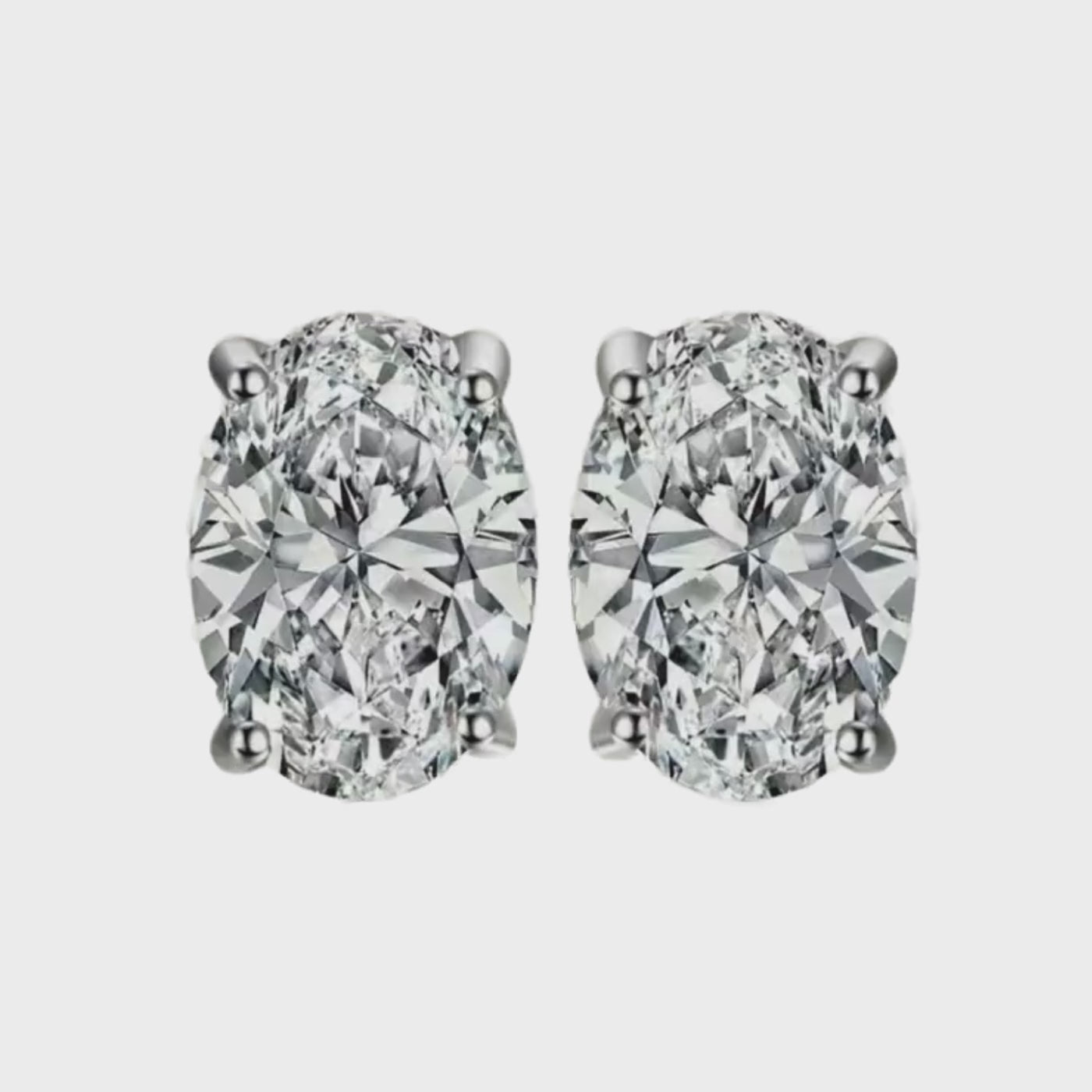 Orecchini Ovale Punto Luce 0.5Ct